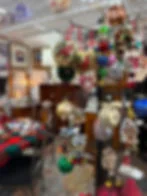 Display rack of vintage Christmas ornaments in vendor mall booth