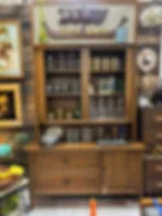 Antique mid century hutch with glassware