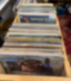 Crate of vinyl records in vendor booth
