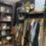 Antique mall booth with vintage clothing and décor
