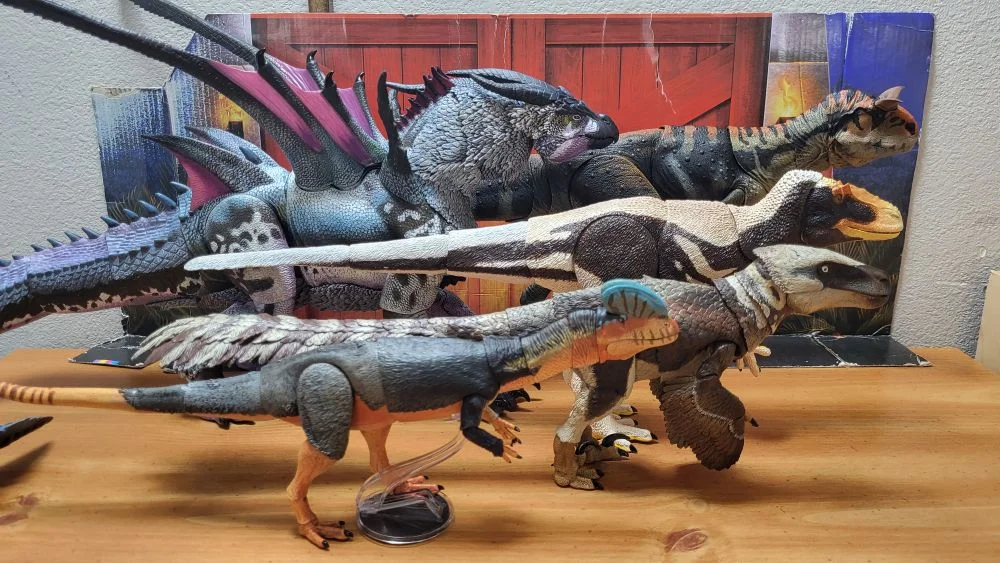 Check the caption for included figures, and positions. Each of the figures are shown from a right side view. Each are in a neutral pose with jaws closed. In front of the reviewer's typical JW background.