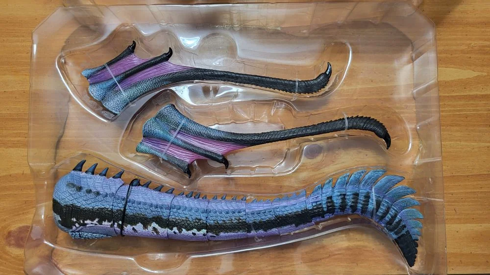 The second plastic tray with the wings and tail.