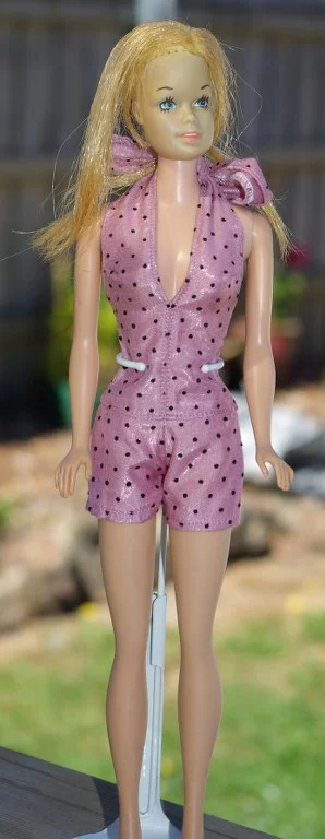 Malibu in halter playsuit.